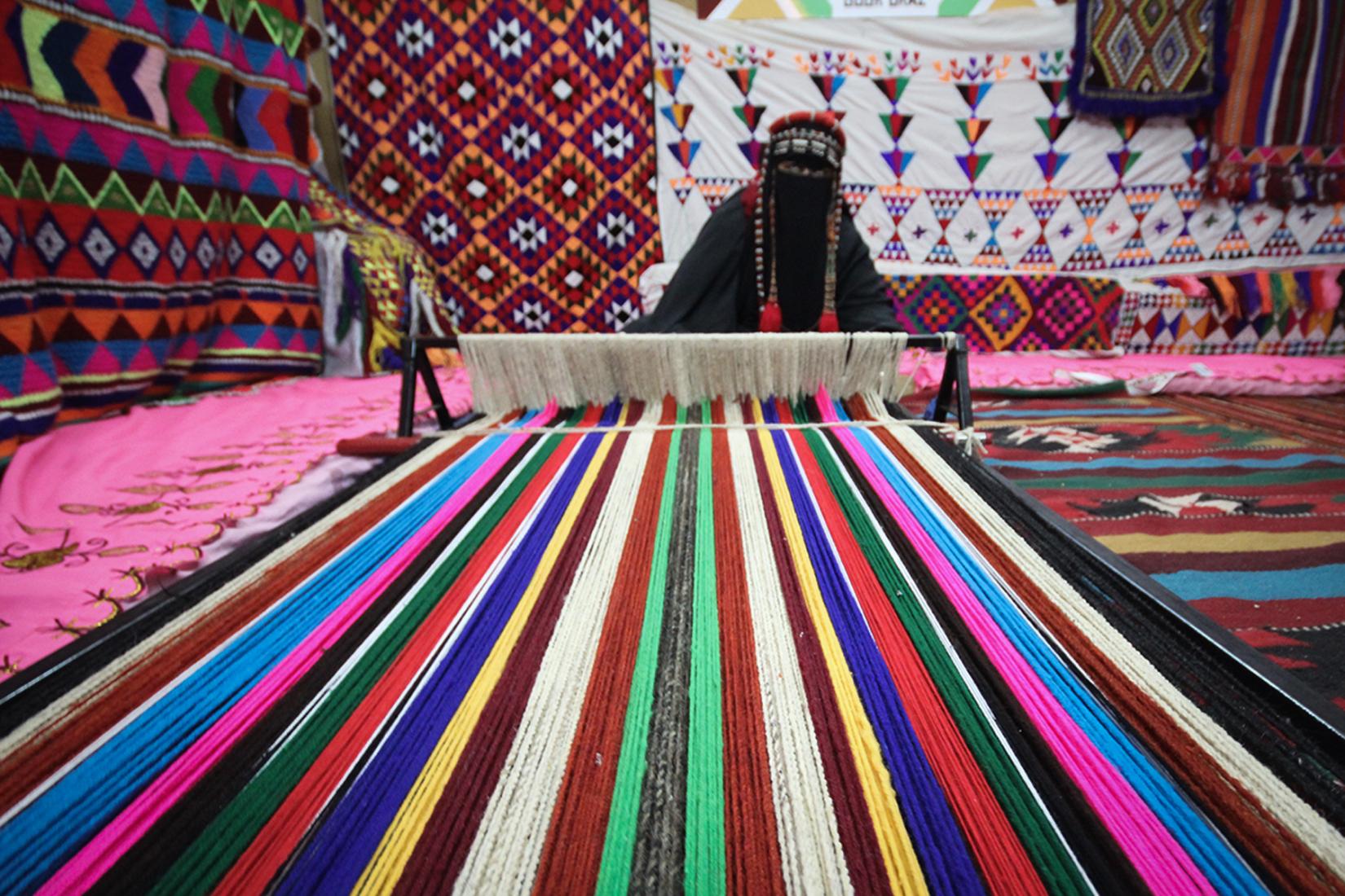 Saudi Woman traditional weaving