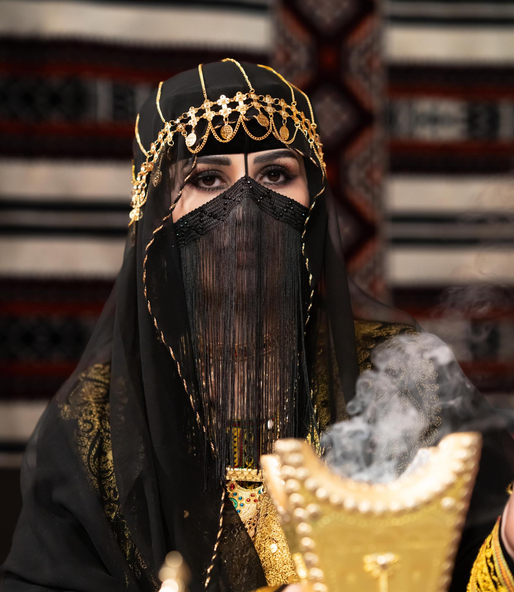 Saudi Woman with Bakhoor (Incense)