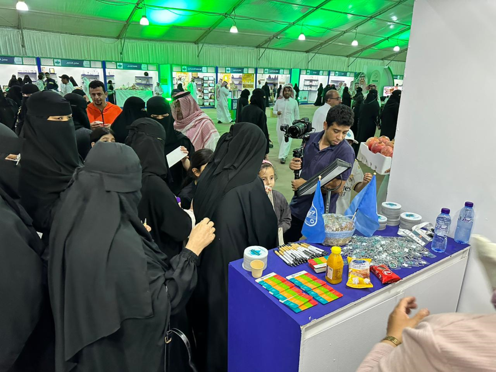 People learning about FAO Booth at the World Food Day Celebrations in Saudi Arabia