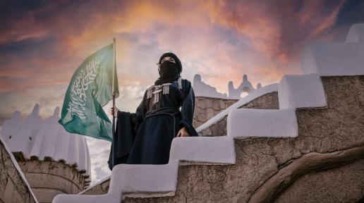 Saudi Woman Holding Flag